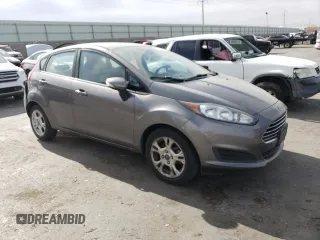 2014 Ford Fiesta SE with VIN 3FADP4EJ0EM195954, listed as a Copart auction lot 51356835 with 75,136 mi miles and Salvage Title. Bid and sale history available at DreamBid. Image 4.