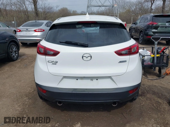 2016 Mazda CX-3 Grand Touring with VIN JM1DKFD73G0129737, listed as a IAAI auction lot 41875808 with 120,547 mi miles. Bid and sale history available at carsss.com. Image 17.