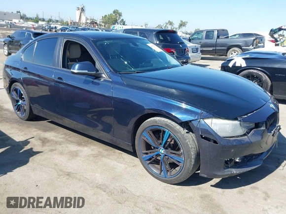2015 BMW 3 Series 328i with VIN WBA3C1C50FK124300, listed as a IAAI auction lot 40112372 with 142,591 mi miles and . Bid and sale history available at carsss.com. Image 1.