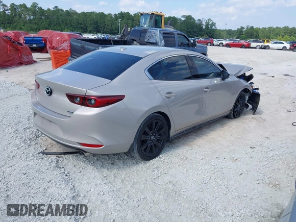 2022 Mazda 3 2.5 Turbo with VIN 3MZBPBAY8NM300598, listed as a IAAI auction lot 42569553 with 27,736 mi miles and . Bid and sale history available at DreamBid. Image 4.