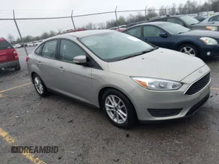 2015 Ford Focus SE with VIN 1FADP3F21FL376579, listed as a IAAI auction lot 41972088 with 129,593 mi miles. Bid and sale history available at carsss.com. Image 1.