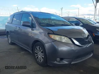 2011 Toyota Sienna XLE AAS with VIN 5TDYK3DC5BS146848, listed as a IAAI auction lot 41914140 with 259,862 mi miles. Bid and sale history available at carsss.com. Image 1.