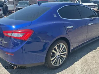 2016 Maserati Ghibli with VIN ZAM57XSA0G1173808, listed as a Copart auction lot 62913645 with 70,097 mi miles and Clean title. Bid and sale history available at DreamBid. Image 4.