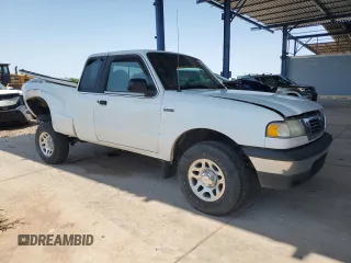 2000 Mazda B-Series 2WD Truck SE with VIN 4F4YR16C6YTM11839, listed as a Copart auction lot 64460754 with 245,958 mi miles and Salvage Title. Bid and sale history available at carsss.com. Image 4.