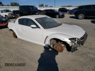 2005 Mazda RX-8 with VIN JM1FE173650147951, listed as a Copart auction lot 76422174 with Not Provided miles and Salvage Title. Bid and sale history available at carsss.com. Image 4.