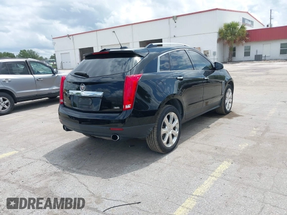 2015 Cadillac SRX Performance Collection z VIN 3GYFNCE31FS597798, wystawiony jako IAAI lot #42387793 z przebiegiem 159 986 mil mil oraz . Historia ofert i sprzedaży dostępna na DreamBid. Obrazek 4.