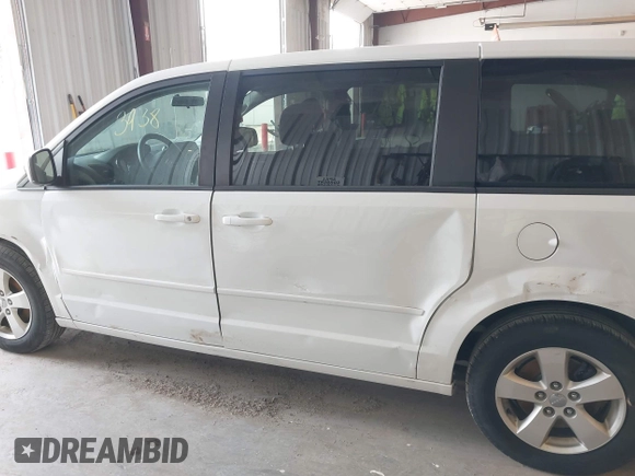 2017 Dodge Grand Caravan SE with VIN 2C4RDGBG4HR736309, listed as a IAAI auction lot 41993938 with 105,213 mi miles and . Bid and sale history available at DreamBid. Image 14.