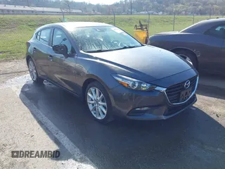 2017 Mazda 3 Touring with VIN 3MZBN1L70HM102817, listed as a IAAI auction lot 41867063 with 100,307 mi miles and . Bid and sale history available at DreamBid. Image 1.