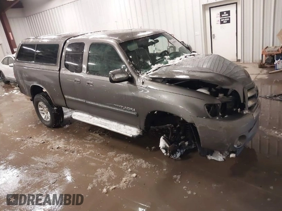 2003 Toyota Tundra SR5 with VIN 5TBBT44163S435531, listed as a IAAI auction lot 41580567 with 199,265 mi miles and . Bid and sale history available at DreamBid. Image 1.