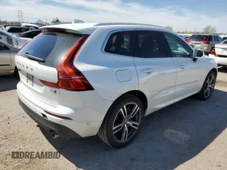 2018 Volvo XC60 Momentum z VIN LYVA22RK3JB097438, wystawiony jako Copart lot #50931375 z przebiegiem 103 743 mil mil oraz Szkoda całkowita • Salvage title. Historia ofert i sprzedaży dostępna na DreamBid. Obrazek 3.