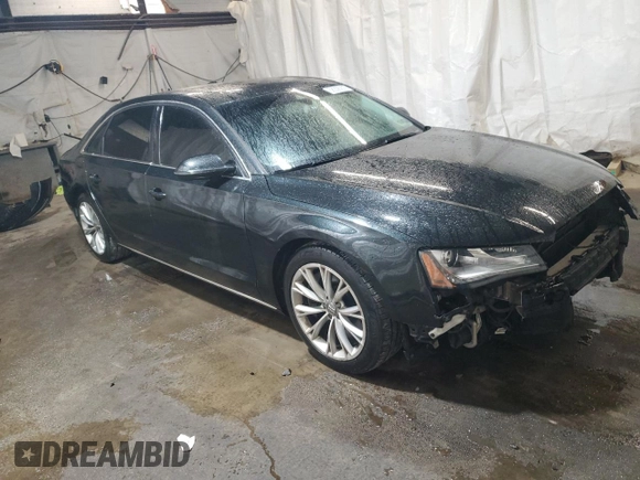 2011 Audi A8 z VIN WAURVAFD7BN006275, wystawiony jako Copart lot #58306205 z przebiegiem 190 383 mil mil oraz Szkody całkowita. Historia ofert i sprzedaży dostępna na DreamBid. Obrazek 4.