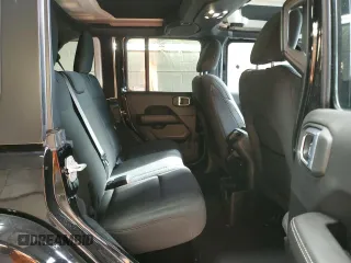 2022 Jeep Wrangler Unlimited Sahara Altitude with VIN 1C4HJXEG0NW115877, listed as a Copart auction lot 80689494 with 30,928 mi miles and Salvage title. Bid and sale history available at DreamBid. Image 11.