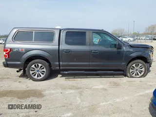 2018 Ford F-150 XL with VIN 1FTEW1EP9JKF56149, listed as a IAAI auction lot 42066727 with 73,689 mi miles and . Bid and sale history available at DreamBid. Image 13.