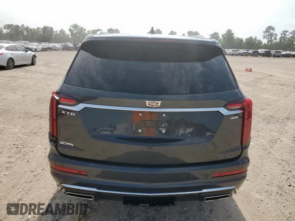 2022 Cadillac XT6 Premium Luxury z VIN 1GYKPCRS1NZ104567, wystawiony jako Copart lot #58211505 z przebiegiem 54 541 mil mil oraz Tytuł czysty. Historia ofert i sprzedaży dostępna na DreamBid. Obrazek 6.