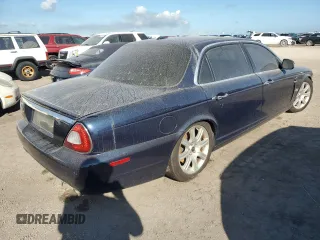 2008 Jaguar XJ with VIN SAJWA79B58SH25389, listed as a Copart auction lot 75014914 with 0 mi miles and Salvage Title. Bid and sale history available at carsss.com. Image 3.