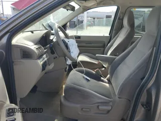 2005 Ford Freestar SE z VIN 2FMDA51635BA60614, wystawiony jako Copart lot #60058044 z przebiegiem 228 858 mil mil oraz Szkody całkowita. Historia ofert i sprzedaży dostępna na DreamBid. Obrazek 7.