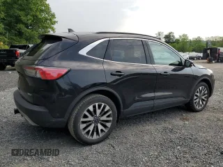 2020 Ford Escape Titanium с VIN 1FMCU9J97LUA20595, выставлен на аукционе Copart как лот 59476745 с пробегом 74 518 миль миль и Списание • Salvage title. История ставок и продаж доступна на DreamBid. Изображение 3.