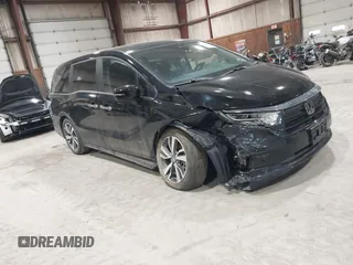 2024 Honda Odyssey Touring z VIN 5FNRL6H80RB044915, wystawiony jako IAAI lot #41921539 z przebiegiem 13 425 mil mil oraz . Historia ofert i sprzedaży dostępna na DreamBid. Obrazek 1.