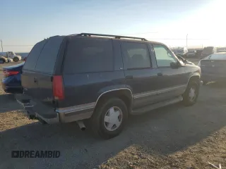 1999 GMC Yukon with VIN 1GKEK13RXXJ748733, listed as a Copart auction lot 74125914 with 172,766 mi miles and Clean Title. Bid and sale history available at carsss.com. Image 3.