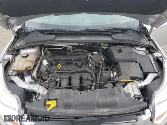 2012 Ford Focus SE with VIN 1FAHP3F2XCL202510, listed as a Copart auction lot 64066545 with 77,828 mi miles and Salvage title. Bid and sale history available at DreamBid. Image 11.