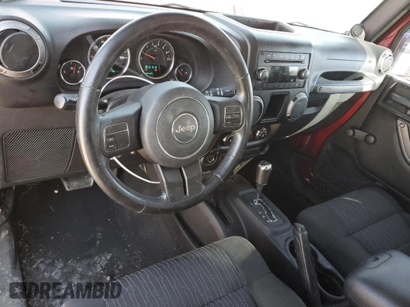 2012 Jeep Wrangler Sport z VIN 1C4AJWAG9CL150787, wystawiony jako Copart lot #50863415 z przebiegiem 68 623 mil mil oraz Szkoda całkowita • Salvage title. Historia ofert i sprzedaży dostępna na DreamBid. Obrazek 8.