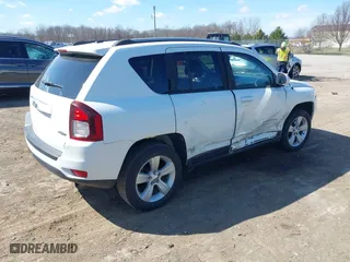 2016 Jeep Compass High Altitude Edition with VIN 1C4NJDEBXGD635864, listed as a IAAI auction lot 41895063 with 95,246 mi miles. Bid and sale history available at carsss.com. Image 4.