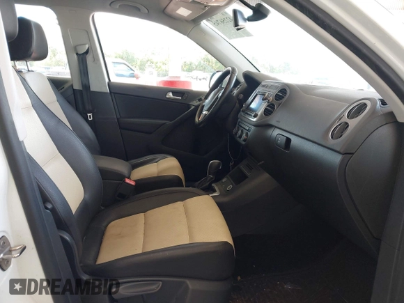 2017 Volkswagen Tiguan S with VIN WVGAV7AX8HK028540, listed as a IAAI auction lot 42256745 with 118,394 mi miles and . Bid and sale history available at DreamBid. Image 5.
