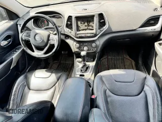 2018 Jeep Cherokee Trailhawk z VIN 1C4PJMBX0JD600413, wystawiony jako Copart lot #60336385 z przebiegiem 64 875 mil mil oraz Czysty tytuł • Clean title. Historia ofert i sprzedaży dostępna na DreamBid. Obrazek 9.