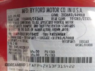 2003 Ford Mustang GT Deluxe with VIN 1FAFP42X13F315422, listed as a IAAI auction lot 42282000 with 200,721 mi miles and . Bid and sale history available at DreamBid. Image 9.