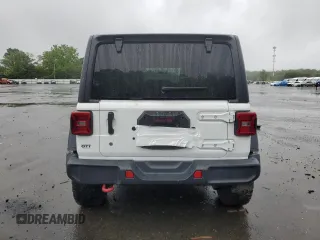 2019 Jeep Wrangler Unlimited Rubicon with VIN 1C4HJXFG8KW678265, listed as a Copart auction lot 57700695 with 120,950 mi miles and Salvage title. Bid and sale history available at DreamBid. Image 6.