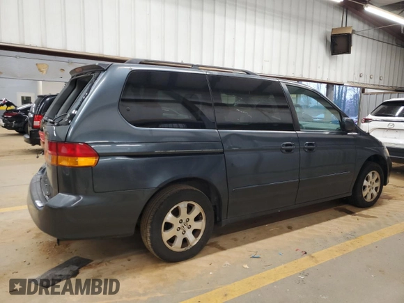 2003 Honda Odyssey EX-L z VIN 5FNRL18993B142649, wystawiony jako Copart lot #86397154 z przebiegiem 339 966 mil mil oraz Szkoda całkowita • Salvage title. Historia ofert i sprzedaży dostępna na DreamBid. Obrazek 3.