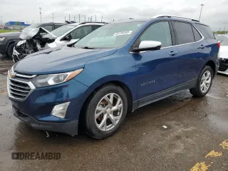 2021 Chevrolet Equinox Premier z VIN 2GNAXNEV1M6139320, wystawiony jako Copart lot #55736585 z przebiegiem 57 343 mil mil oraz Szkoda całkowita • Salvage title. Historia ofert i sprzedaży dostępna na DreamBid. Obrazek 1.