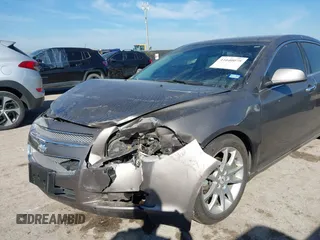 2012 Chevrolet Malibu LTZ with VIN 1G1ZG5E74CF133103, listed as a IAAI auction lot 41640075 with 173,692 mi miles and . Bid and sale history available at DreamBid. Image 6.