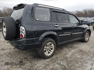2004 Suzuki XL7 LX z VIN JS3TX92V344110661, wystawiony jako Copart lot #43613315 z przebiegiem 143 334 mil mil oraz Szkoda całkowita • Salvage title. Historia ofert i sprzedaży dostępna na DreamBid. Obrazek 3.