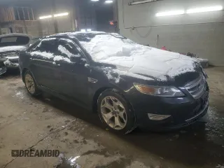 2012 Ford Taurus SHO with VIN 1FAHP2KT6CG138628, listed as a Copart auction lot 46219235 with 131,998 mi miles and Salvage title. Bid and sale history available at DreamBid. Image 4.