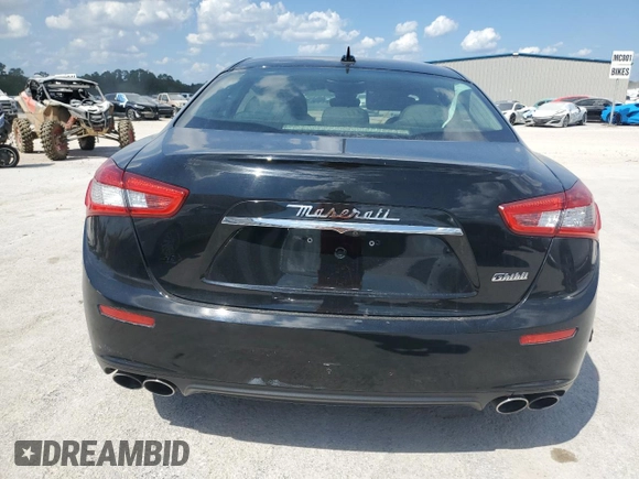 2018 Maserati Ghibli GranSport with VIN ZAM57XSSXJ1300791, listed as a Copart auction lot 72569914 with 103,484 mi miles and Salvage Title. Bid and sale history available at carsss.com. Image 6.