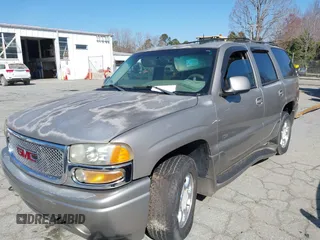 2002 GMC Yukon Denali z VIN 1GKEK63U82J341696, wystawiony jako IAAI lot #41772116 z przebiegiem 259 337 mil mil oraz . Historia ofert i sprzedaży dostępna na DreamBid. Obrazek 2.