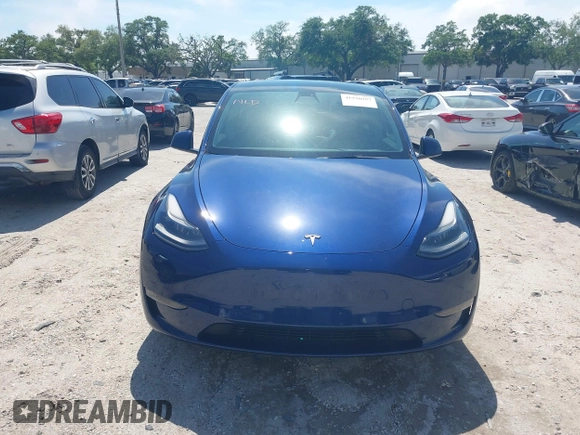 2023 Tesla Model Y Performance with VIN 7SAYGDEF9PF582908, listed as a IAAI auction lot 41930957 with 52,857 mi miles and . Bid and sale history available at DreamBid. Image 11.