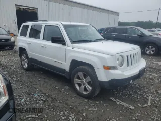 2016 Jeep Patriot Latitude with VIN 1C4NJRFB9GD586698, listed as a Copart auction lot 61131125 with 154,679 mi miles and Salvage title. Bid and sale history available at DreamBid. Image 4.