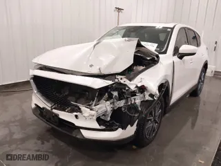 2017 Mazda CX-5 Grand Touring with VIN JM3KFBDL1H0203358, listed as a IAAI auction lot 41526776 with 63,167 mi miles. Bid and sale history available at carsss.com. Image 6.