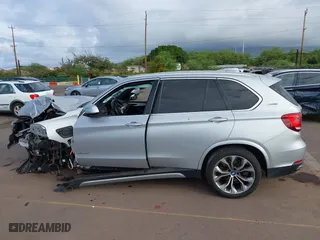 2018 BMW X5 xDrive40e iPerformance with VIN 5UXKT0C59J0W01768, listed as a IAAI auction lot 41603257 with 1 mi miles. Bid and sale history available at carsss.com. Image 15.