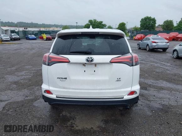 2018 Toyota RAV4 LE with VIN 2T3BFREV7JW851015, listed as a IAAI auction lot 42354042 with 94,603 mi miles and . Bid and sale history available at DreamBid. Image 16.