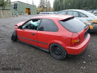 1996 Honda Civic DX with VIN 2HGEJ6340TH104798, listed as a Copart auction lot 80360674 with 176,629 mi miles and Salvage Title. Bid and sale history available at carsss.com. Image 2.