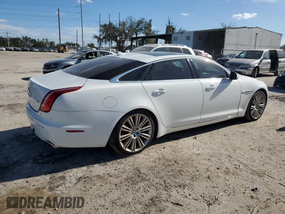 2013 Jaguar XJ Supercharged with VIN SAJWA2GE3DMV45811, listed as a Copart auction lot 76585864 with 53,570 mi miles and Salvage title. Bid and sale history available at DreamBid. Image 3.