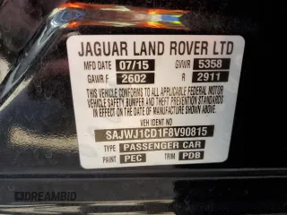 2015 Jaguar XJ with VIN SAJWJ1CD1F8V90815, listed as a Copart auction lot 77977464 with Not provided miles and Salvage title. Bid and sale history available at DreamBid. Image 12.
