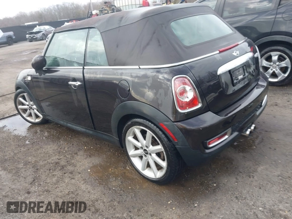 2013 MINI Convertible S with VIN WMWZP3C54DT297304, listed as a IAAI auction lot 41377572 with 101,991 mi miles and . Bid and sale history available at DreamBid. Image 3.