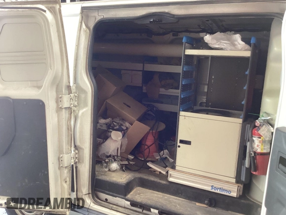 2015 Ford Transit Cargo with VIN 1FTNR1ZM1FKA44965, listed as a IAAI auction lot 42679340 with 151,641 mi miles and . Bid and sale history available at DreamBid. Image 3.