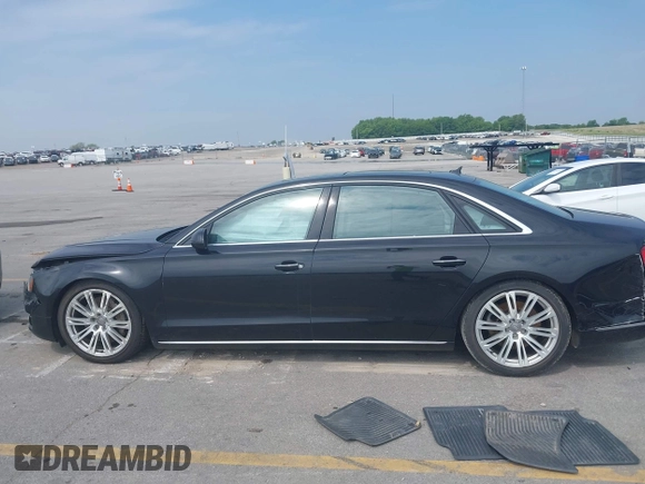 2015 Audi A8 4.0T with VIN WAU32AFD6FN002710, listed as a IAAI auction lot 42447149 with 109,791 mi miles and . Bid and sale history available at DreamBid. Image 13.