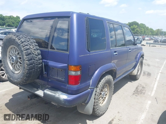 1998 Isuzu Trooper S with VIN JACDJ58X7W7914970, listed as a IAAI auction lot 42527384 with 178,470 mi miles and . Bid and sale history available at DreamBid. Image 4.