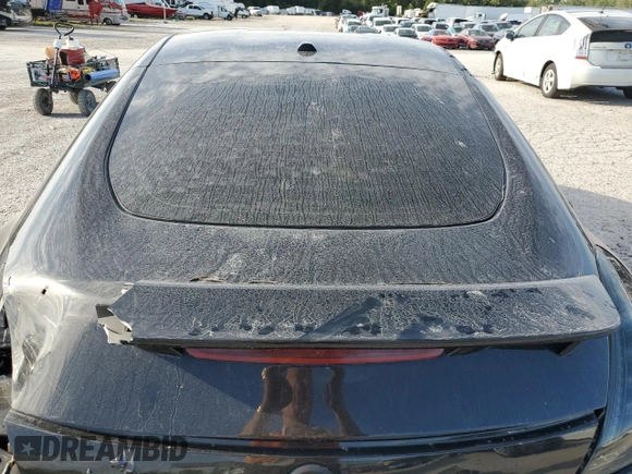 2014 Nissan 370Z z VIN JN1AZ4EH9EM636239, wystawiony jako Copart lot #69833264 z przebiegiem 110 802 mil mil oraz Szkoda całkowita • Salvage title. Historia ofert i sprzedaży dostępna na DreamBid. Obrazek 10.